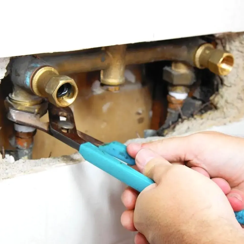 Repairing a leaking pipe in the wall or ceiling